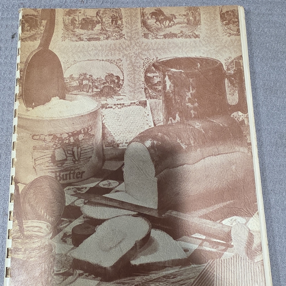 Vintage Cookbook with Rustic Cover Art